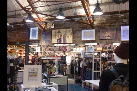 The Camden branch uses features of the building, such as the narrow entrance of the former cinema